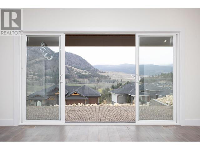 579 Barra Lane, House detached with 8 bedrooms, 6 bathrooms and 5 parking in Kelowna BC | Image 21