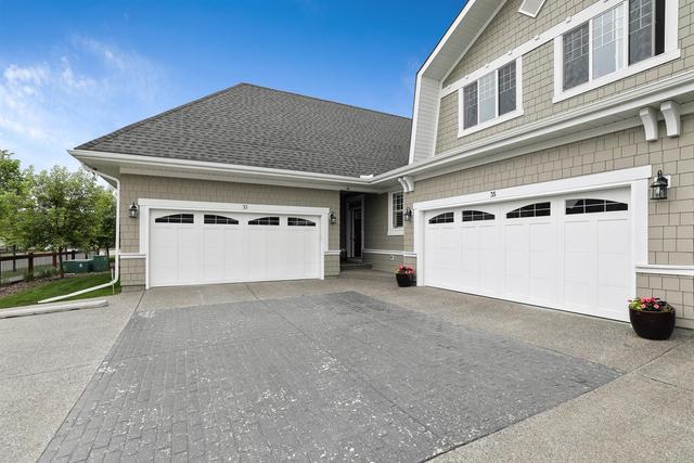 33 Riviera Way, Home with 3 bedrooms, 2 bathrooms and 2 parking in Cochrane AB | Image 41