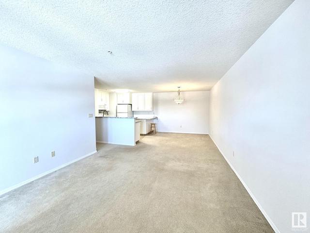206 - 4604 48a St, Condo with 2 bedrooms, 1 bathrooms and null parking in Leduc AB | Image 22