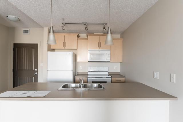 2401 - 135b Sandpiper Road, Condo with 1 bedrooms, 1 bathrooms and 1 parking in Wood Buffalo AB | Image 11