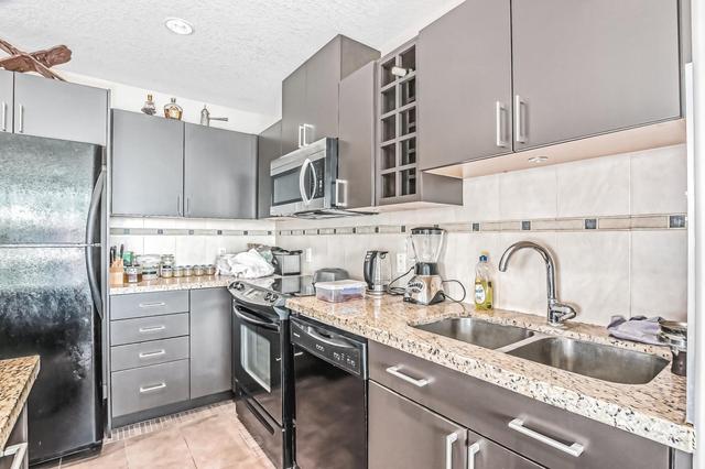 2203 - 77 Spruce Place Sw, Condo with 2 bedrooms, 2 bathrooms and 1 parking in Calgary AB | Image 4