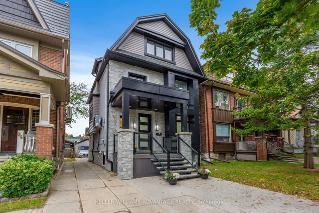 36 Lockwood Rd, House detached with 4 bedrooms, 5 bathrooms and 2 parking in Toronto ON | Image 1