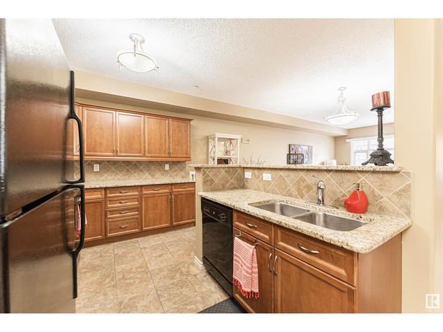 306 - 121 Festival Wy, Condo with 2 bedrooms, 1 bathrooms and 2 parking in Edmonton AB | Card Image