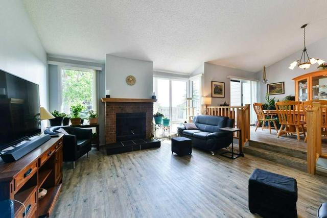 18 - 185 Woodridge Drive Sw, Home with 3 bedrooms, 3 bathrooms and 4 parking in Calgary AB | Image 12