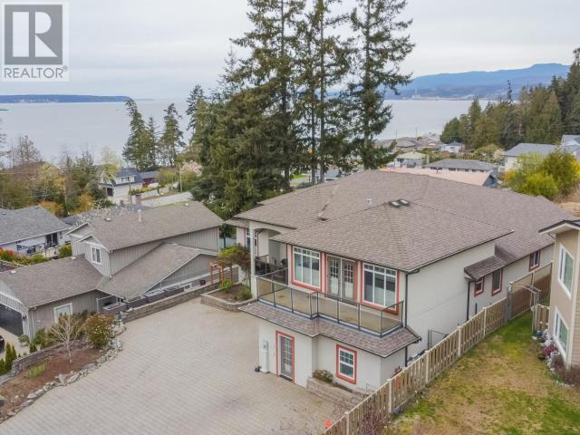 6929 Retaskit Crt, House detached with 5 bedrooms, 4 bathrooms and 2 parking in Powell River BC | Image 16