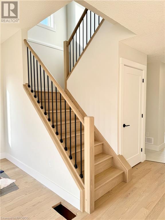 Hardwood staircase to the 2nd floor | Image 13