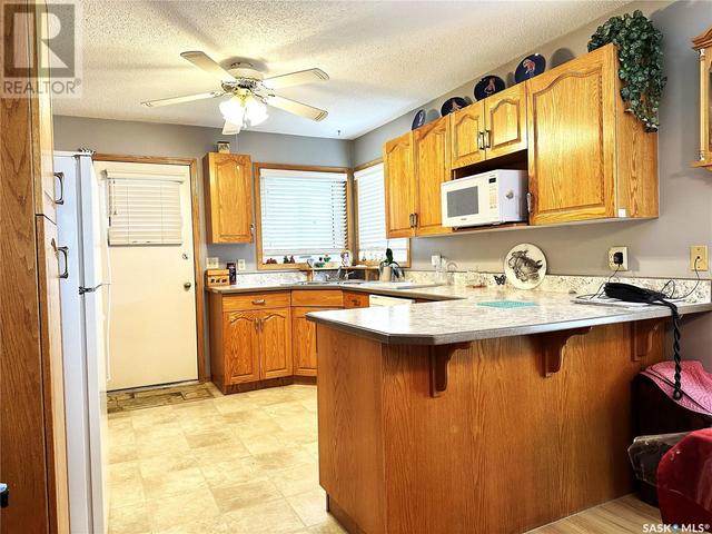 1005 6th Avenue, House attached with 2 bedrooms, 3 bathrooms and null parking in Humboldt SK | Image 15