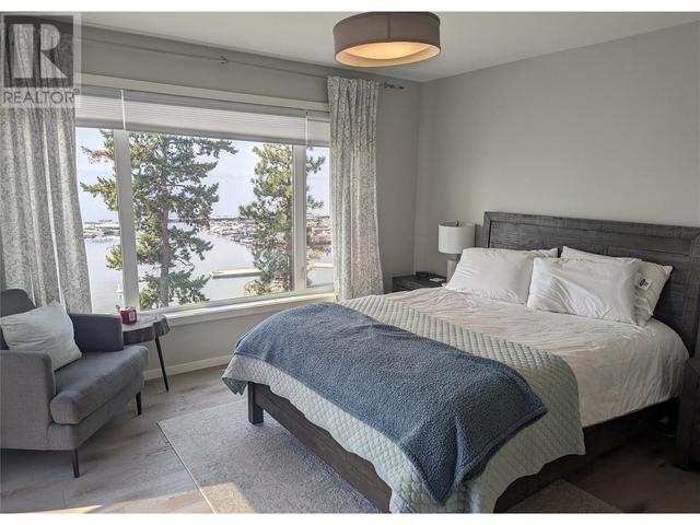 104 - 3398 Mckinley Beach Lane, House attached with 2 bedrooms, 2 bathrooms and 1 parking in Kelowna BC | Image 20