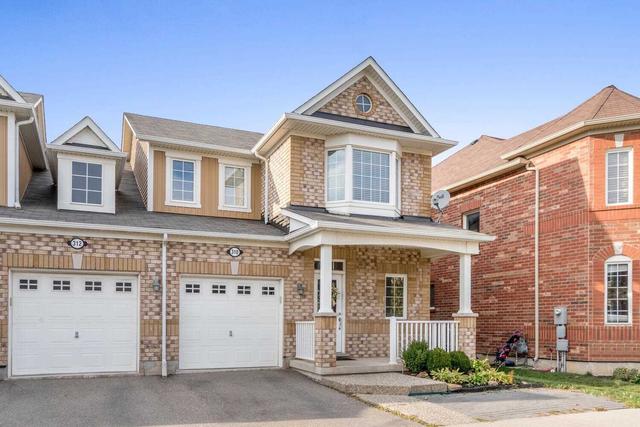 310 Chuchmach Clse, House attached with 3 bedrooms, 3 bathrooms and 2 parking in Milton ON | Image 1