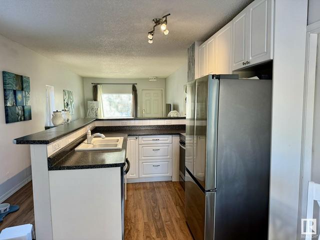 12219 91 St Nw, House detached with 2 bedrooms, 2 bathrooms and null parking in Edmonton AB | Image 12