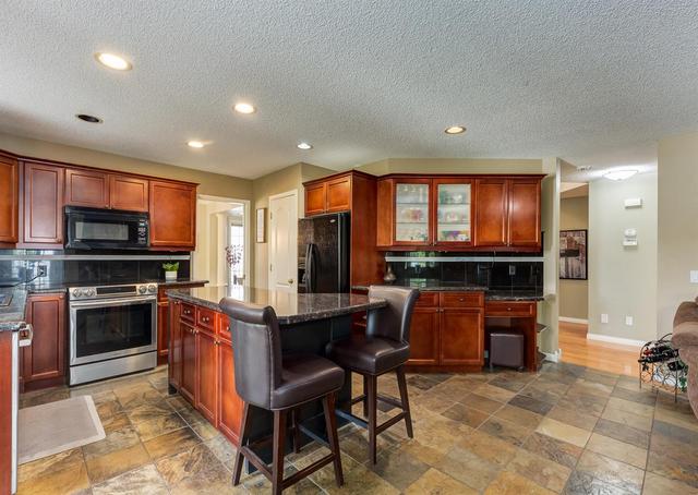 12821 Douglasview Boulevard Se, House detached with 4 bedrooms, 3 bathrooms and 6 parking in Calgary AB | Image 10