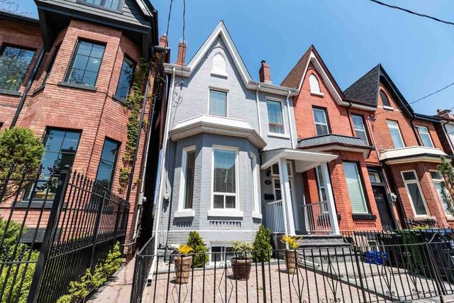 34 Rolyat St, House attached with 4 bedrooms, 2 bathrooms and 2 parking in Toronto ON | Image 1