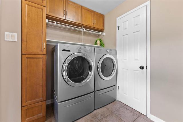 laundry and entry from garage | Image 30