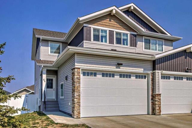 64 Cameron Close, Home with 4 bedrooms, 3 bathrooms and 2 parking in Sylvan Lake AB | Image 2