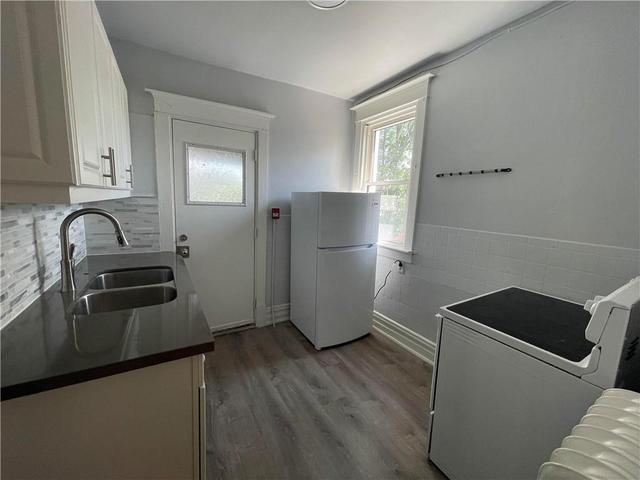 f - 25 West Avenue S, Condo with 1 bedrooms, 1 bathrooms and 1 parking in Hamilton ON | Image 1