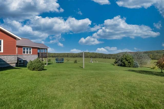 294 Best Road Rd, House detached with 4 bedrooms, 3 bathrooms and 15 parking in Hastings Highlands ON | Image 2