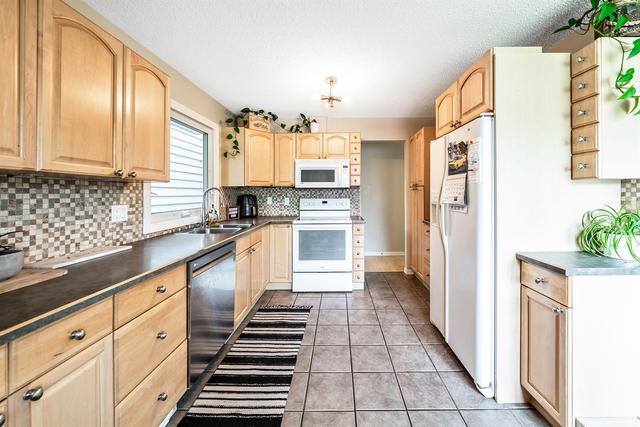 56 Midglen Drive Se, House detached with 4 bedrooms, 1 bathrooms and 2 parking in Calgary AB | Image 3