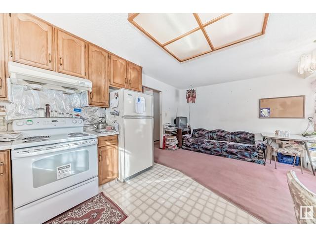 9647 106a Av Nw, House detached with 6 bedrooms, 3 bathrooms and 4 parking in Edmonton AB | Image 12