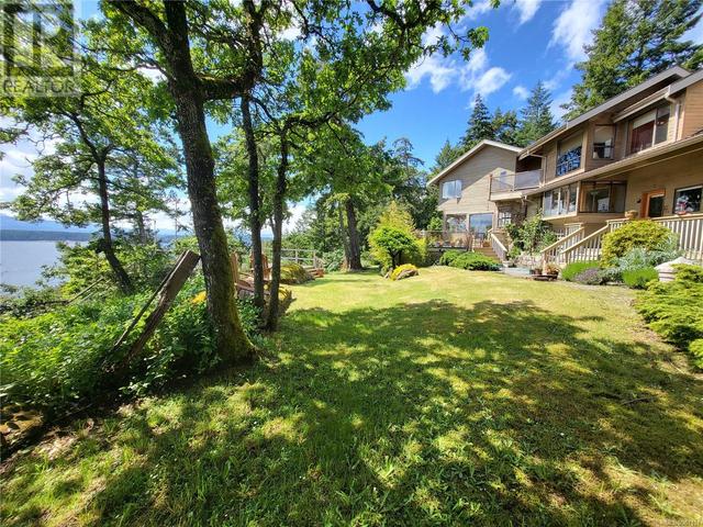 2565 Islands View Dr, House detached with 5 bedrooms, 3 bathrooms and 6 parking in Nanaimo B BC | Image 42