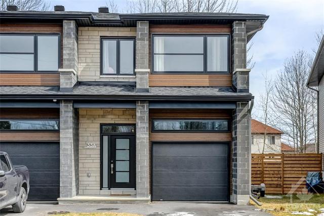a - 33 Bourque Street, Townhouse with 3 bedrooms, 3 bathrooms and 5 parking in The Nation ON | Image 1