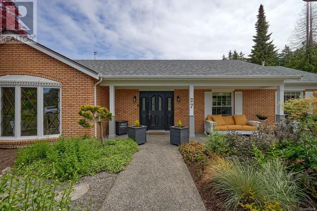 Low maintenance home with brick siding, 8 year old roofing, mature perennial beds | Image 1