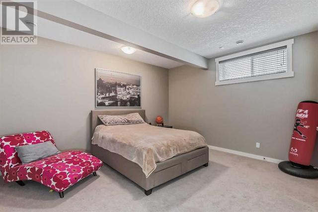 128 Mike Ralph Way Sw, House detached with 4 bedrooms, 3 bathrooms and 2 parking in Calgary AB | Image 45