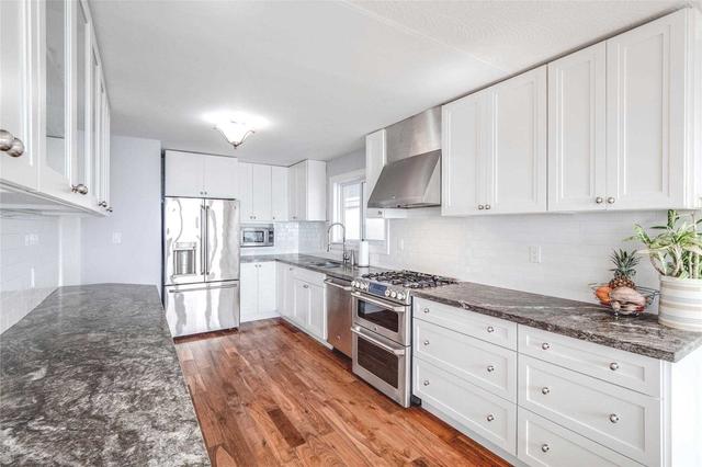 7 Eleventh St, House detached with 3 bedrooms, 2 bathrooms and 4 parking in Toronto ON | Image 2