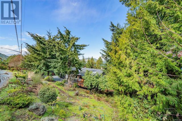 8170 Southwind Dr, House detached with 4 bedrooms, 3 bathrooms and 5 parking in Lantzville BC | Image 70