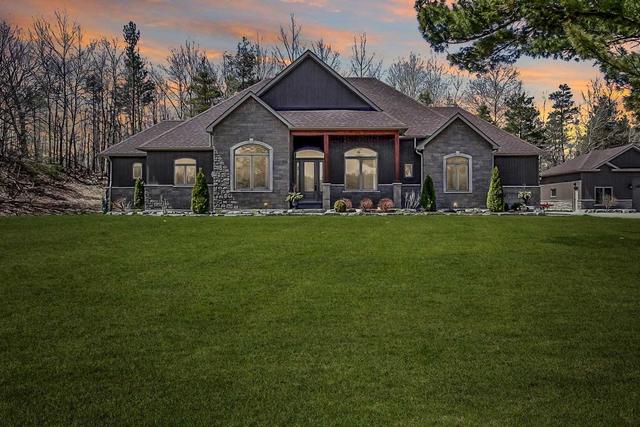 6152 Penetanguishene Rd, House detached with 3 bedrooms, 4 bathrooms and 12 parking in Springwater ON | Image 1