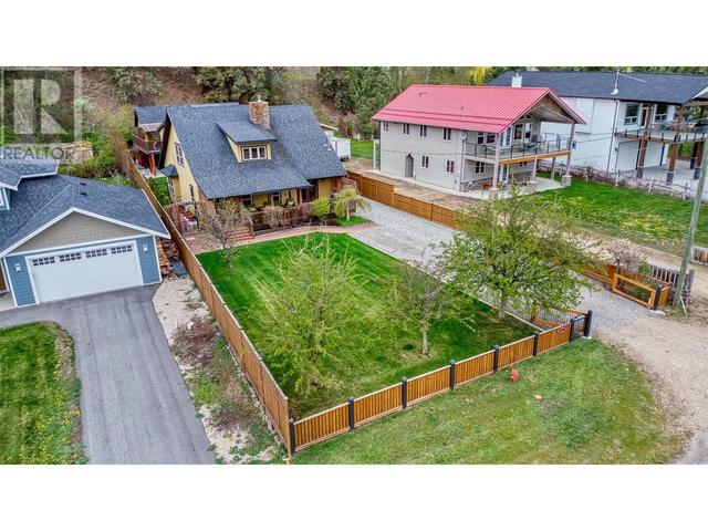 7390 Fintry Delta Road, House detached with 3 bedrooms, 3 bathrooms and 8 parking in Central Okanagan West BC | Image 49