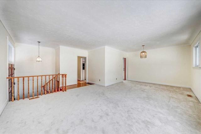 14 Grassington Cres, House detached with 3 bedrooms, 1 bathrooms and 4 parking in Toronto ON | Image 3