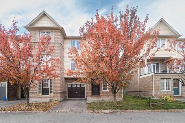 107 - 620 Ferguson Dr, House attached with 3 bedrooms, 2 bathrooms and 2 parking in Milton ON | Card Image