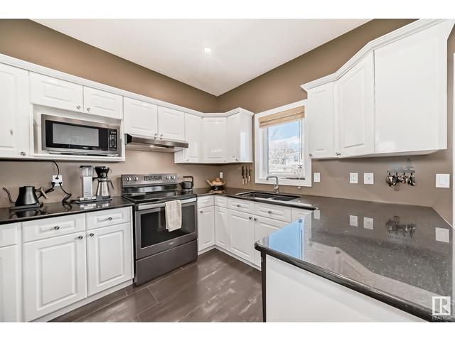 7723 111 St Nw, House semidetached with 4 bedrooms, 3 bathrooms and 4 parking in Edmonton AB | Image 11