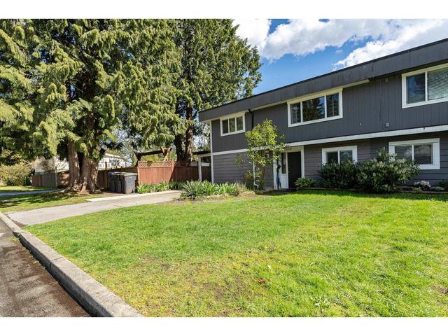 1896 Patricia Avenue, House detached with 4 bedrooms, 2 bathrooms and null parking in Port Coquitlam BC | Card Image