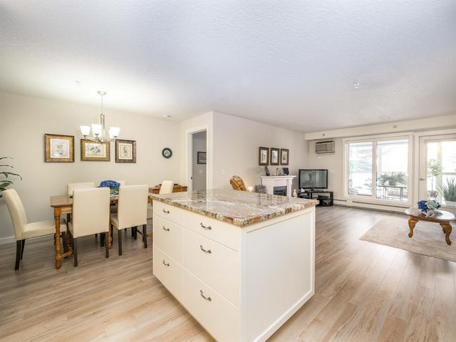 124 - 7229 Sierra Morena Boulevard Sw, Condo with 2 bedrooms, 2 bathrooms and 1 parking in Calgary AB | Image 1