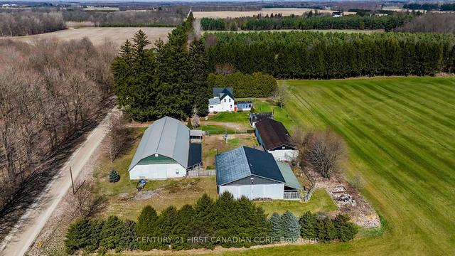 23698 Sutherland Rd, House detached with 4 bedrooms, 3 bathrooms and 12 parking in Strathroy Caradoc ON | Image 1