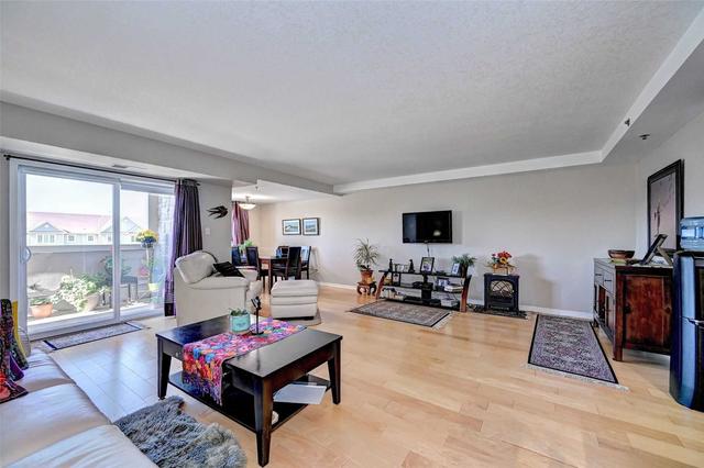 201 - 345 Fisher Mills Rd, Condo with 2 bedrooms, 2 bathrooms and 1 parking in Cambridge ON | Image 4