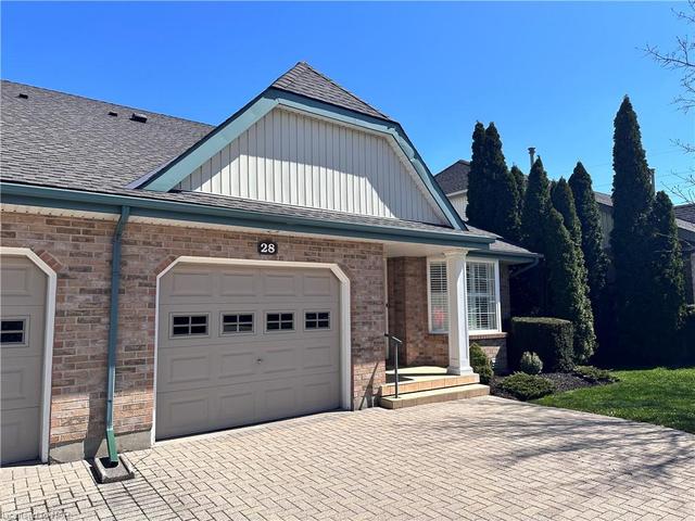Double interlock driveway and attached garage; plenty of private parking space! | Image 12