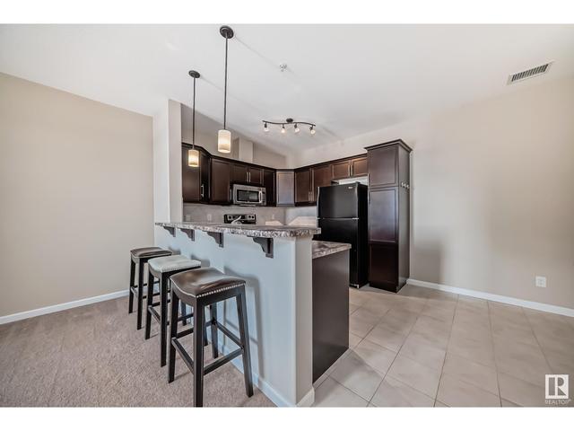 310 - 6083 Maynard Wy Nw, Condo with 1 bedrooms, 1 bathrooms and 2 parking in Edmonton AB | Image 9