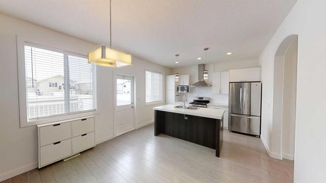 11227 75a Avenue, Home with 4 bedrooms, 3 bathrooms and null parking in Grande Prairie AB | Image 6
