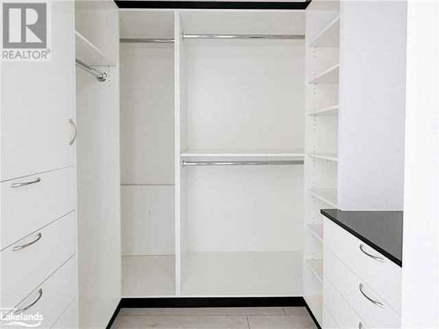 Walk-in Closet with Built in Drawers & Shelving | Image 4