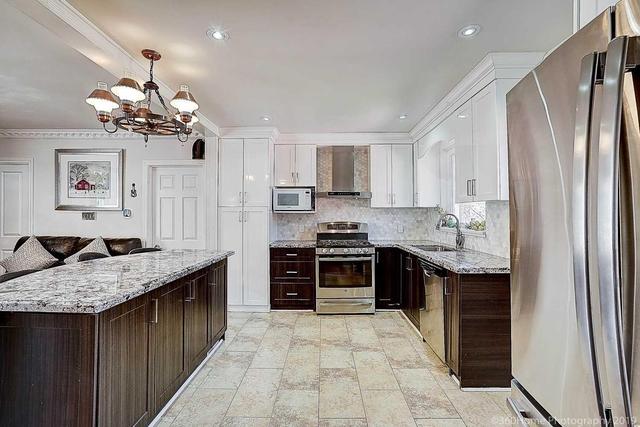 50 Treverton Dr, House detached with 4 bedrooms, 3 bathrooms and 4 parking in Toronto ON | Image 4