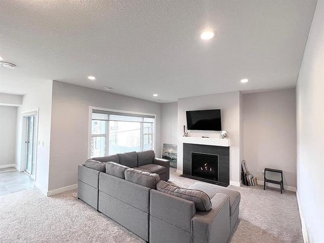 Family Room on Lower  Floor w/ Gas Fireplace | Image 34