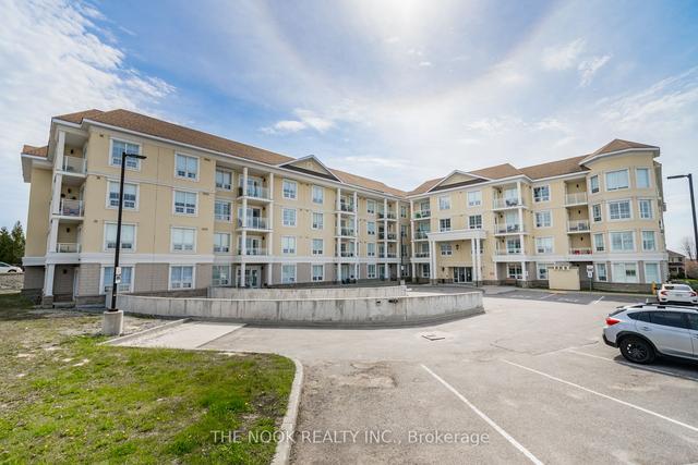 415 - 21 Brookhouse Dr, Condo with 2 bedrooms, 2 bathrooms and 1 parking in Clarington ON | Image 1