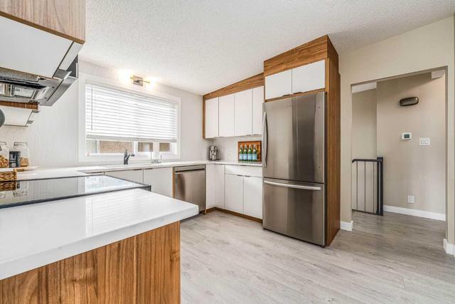 3768 36 Avenue Sw, Home with 4 bedrooms, 2 bathrooms and 2 parking in Calgary AB | Image 13