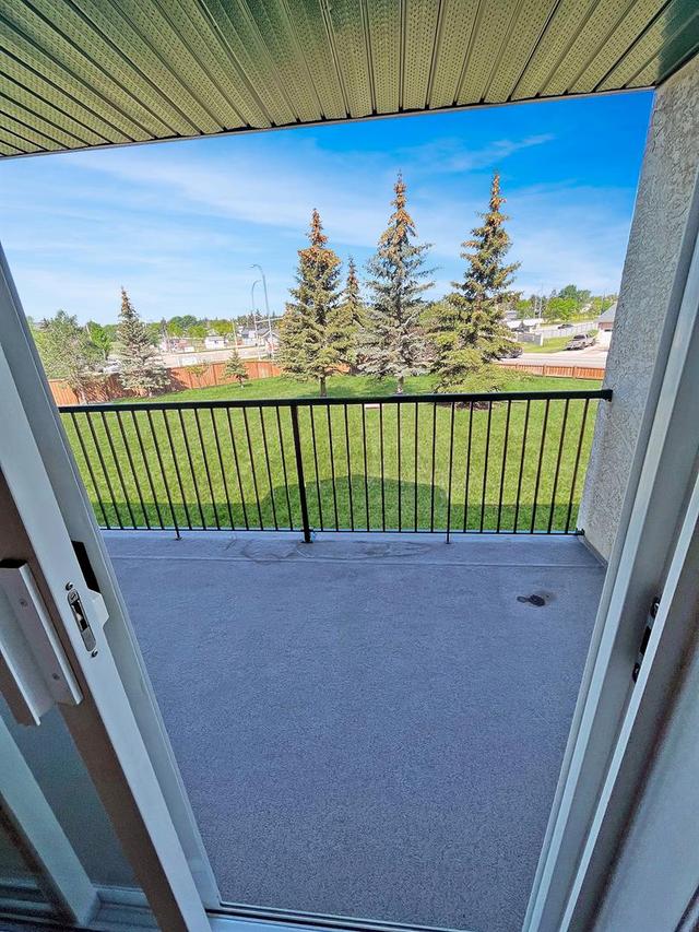 207 - 9111 104 Avenue, Condo with 2 bedrooms, 2 bathrooms and 1 parking in Grande Prairie AB | Image 22