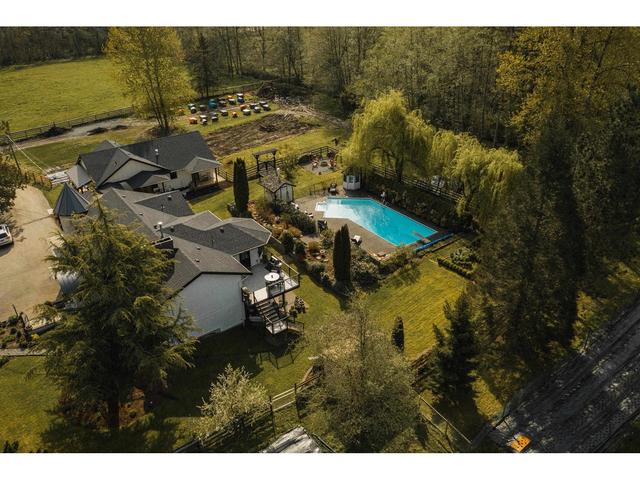 21326 2 Avenue, House detached with 7 bedrooms, 6 bathrooms and 8 parking in Langley BC | Image 3