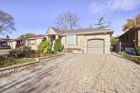 62 Mooreshead Dr, House detached with 3 bedrooms, 2 bathrooms and 5 parking in Toronto ON | Card Image