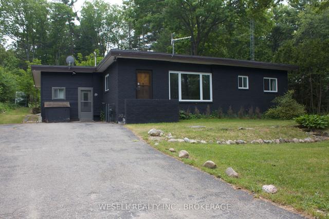 1986 Champlain Rd, House detached with 4 bedrooms, 2 bathrooms and 4 parking in Tiny ON | Image 1
