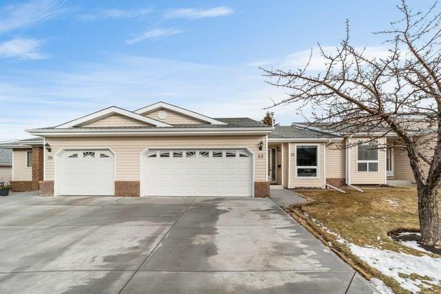 32 Macewan Park Heights Nw, Home with 3 bedrooms, 2 bathrooms and 4 parking in Calgary AB | Image 16